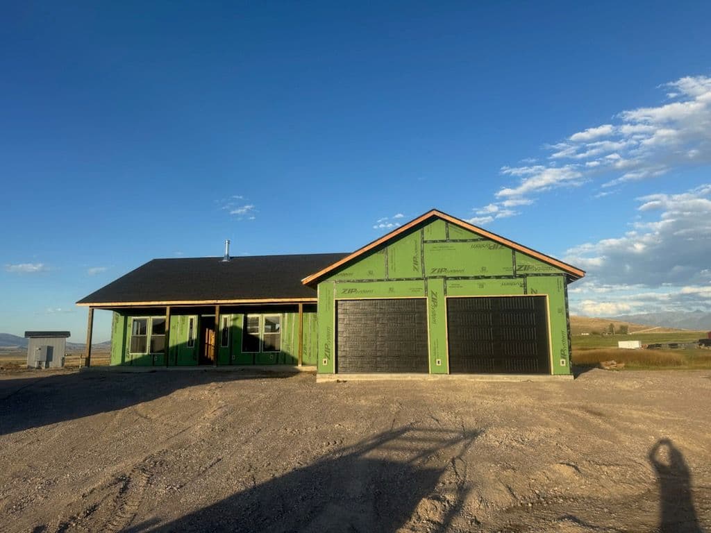 Project New Home Construction with Spacious Garage in Open Countryside image