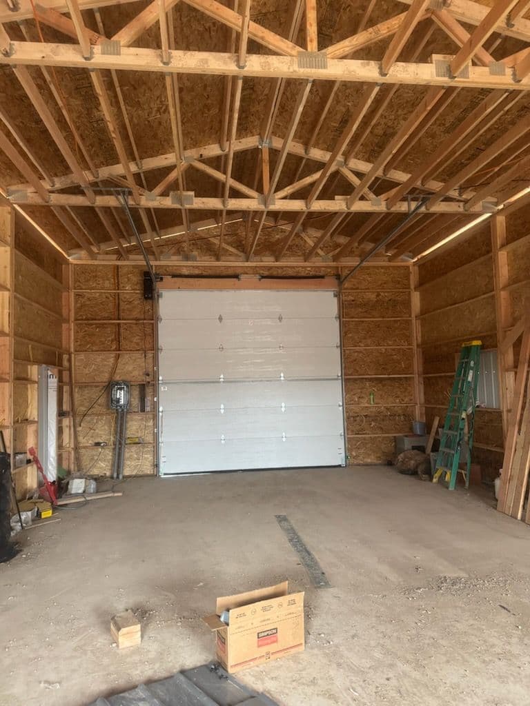 Pole Barn Garage Door Installation in Progress